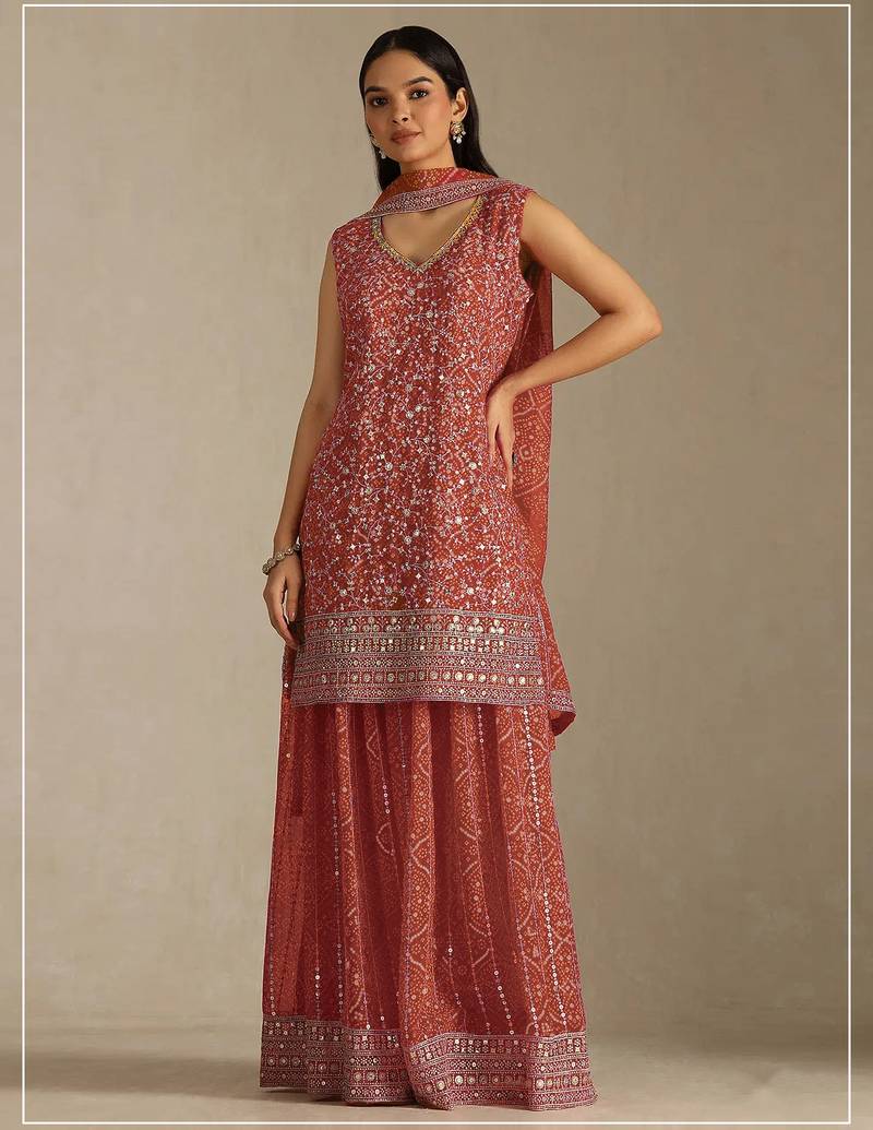 Rust color digital printed embroideried faux georgette semi stitched salwar suit