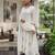 Elegant white straight kurti pant set with rose motif embroidery for women