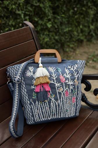  thread bloom navy floral embroidered cotton canvas handheld bag