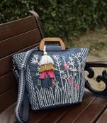   thread bloom navy floral embroidered cotton canvas handheld bag