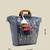   thread bloom navy floral embroidered cotton canvas handheld bag