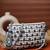   petal posh navy blue & off white beaded cotton jacquard sling bag