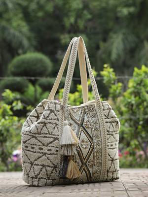  folklore edit ivory geometric shell embellished jacquard hobo bag 1