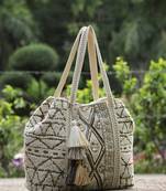   folklore edit ivory geometric shell embellished jacquard hobo bag