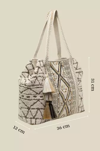   folklore edit ivory geometric shell embellished jacquard hobo bag