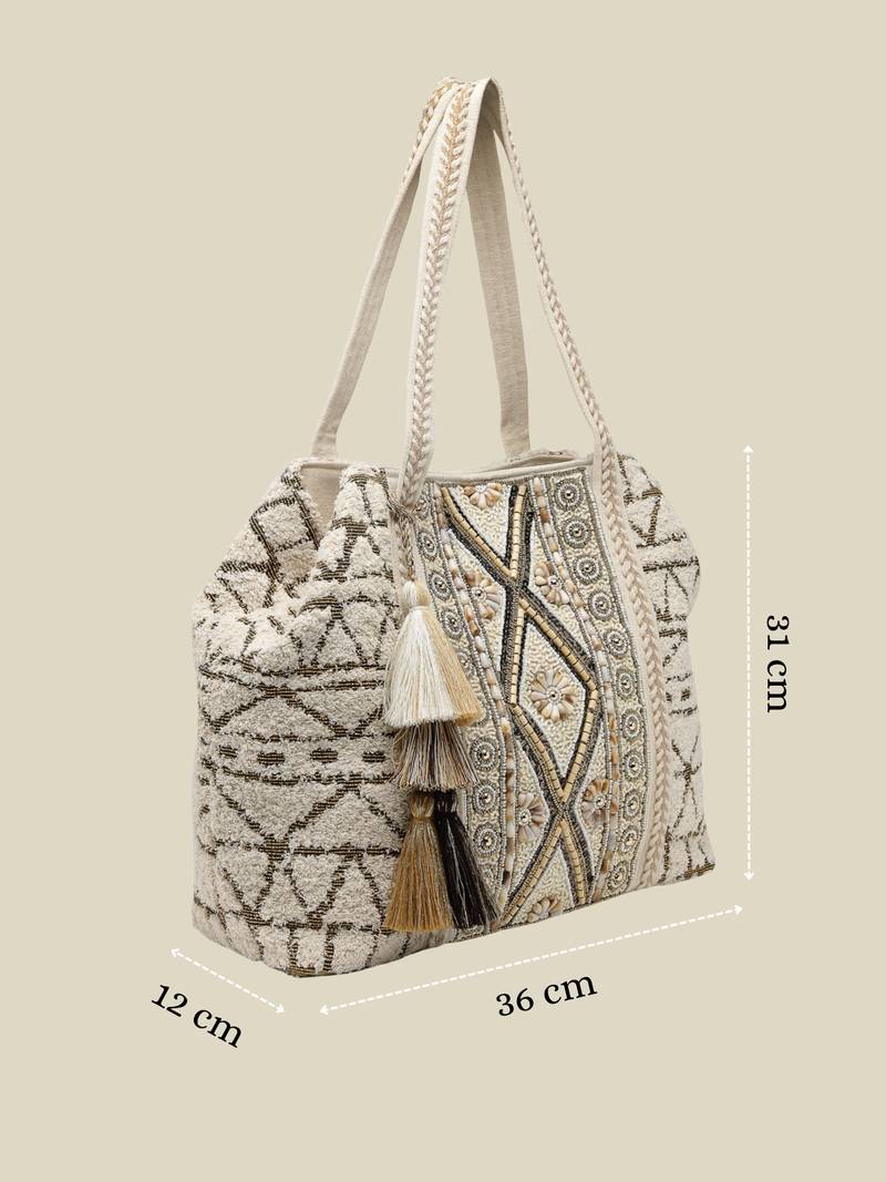   folklore edit ivory geometric shell embellished jacquard hobo bag
