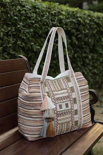   folklore edit blush pink tribal geometric jacquard hobo bag