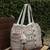   folklore edit blush pink tribal geometric jacquard hobo bag