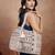  folklore edit blush pink tribal geometric jacquard hobo bag