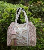   folklore edit blush pink & gold abstract beaded jacquard hobo bag