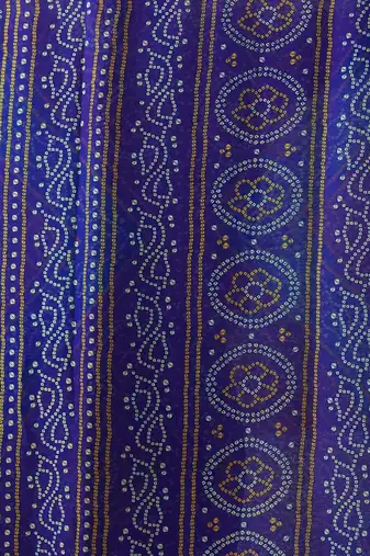 Women's blue bandhani print chiffon bandhej style saree with matching blouse