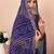 Women's blue turquoise bandhani print chiffon bandhej style saree with matching blouse