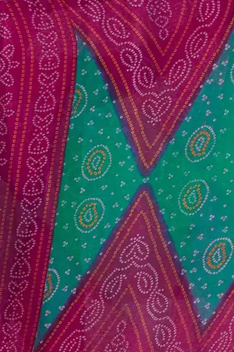Women's magenta bandhani print chiffon bandhej style saree with matching blouse