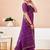 Women's purple bandhani print chiffon bandhej style saree with matching blouse