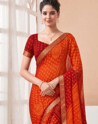 Women's maroon bandhani print chiffon bandhej style saree with matching blouse 2