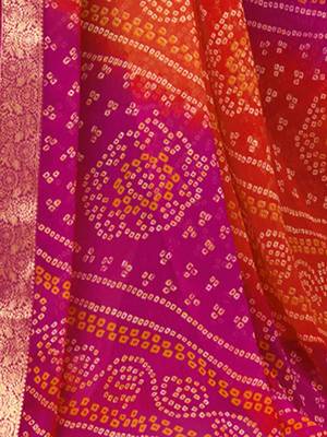 Women's orange pink bandhani print chiffon bandhej style saree with matching blouse 4