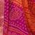 Women's orange pink bandhani print chiffon bandhej style saree with matching blouse
