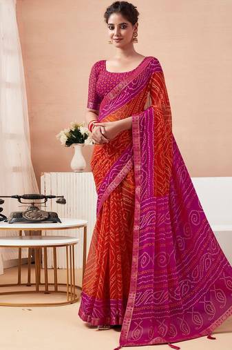Women's orange bandhani print chiffon bandhej style saree with matching blouse