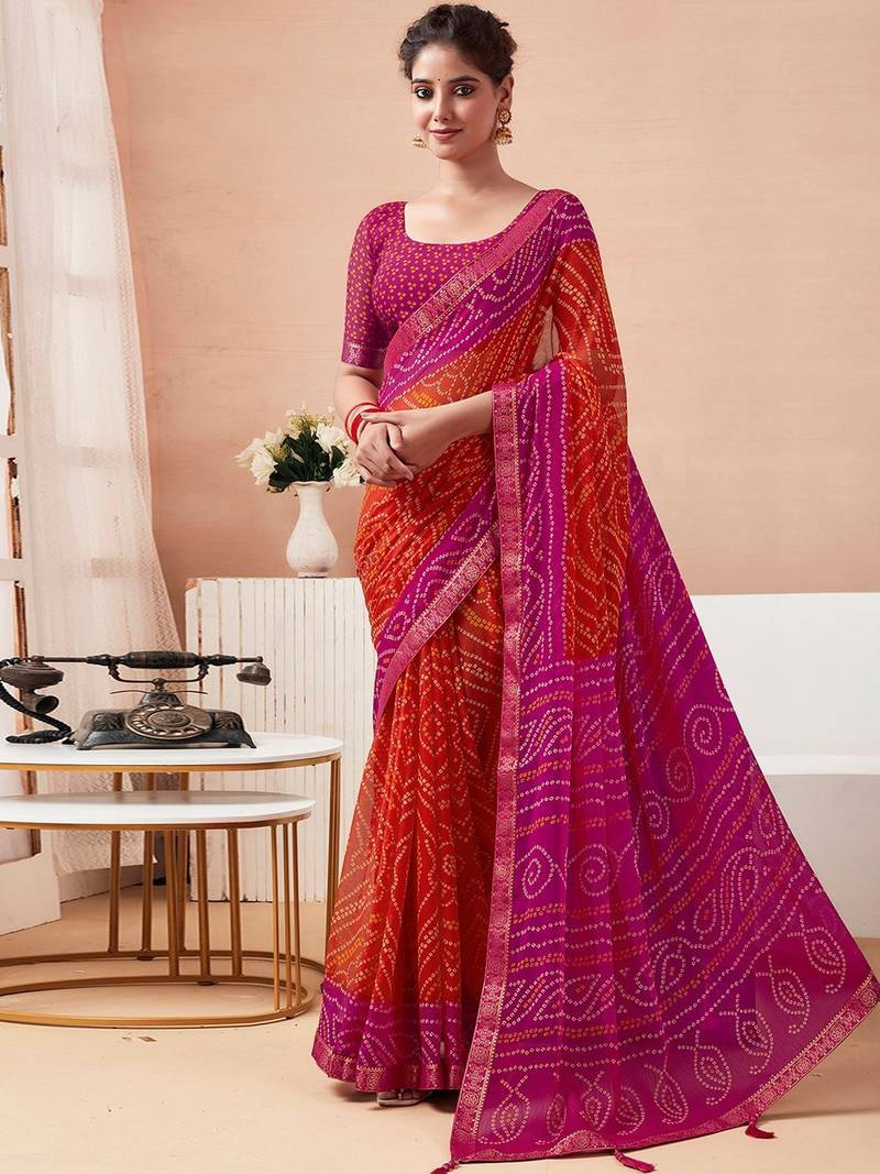 Women's orange bandhani print chiffon bandhej style saree with matching blouse