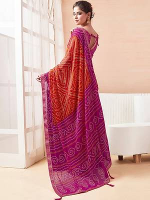 Women's orange bandhani print chiffon bandhej style saree with matching blouse 4