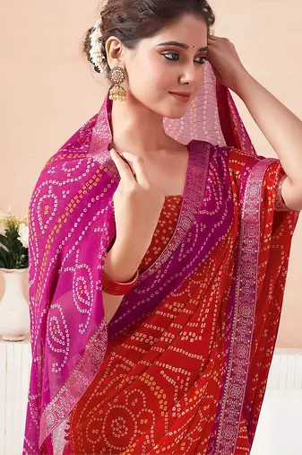 Women's orange bandhani print chiffon bandhej style saree with matching blouse