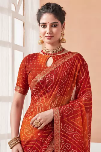 Women's red orange bandhani print chiffon bandhej style saree with matching blouse