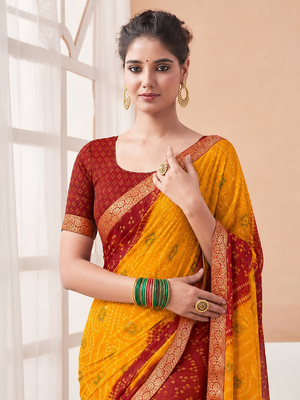 Women's yellow bandhani print chiffon bandhej style saree with matching blouse 2