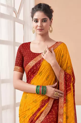 Women's yellow bandhani print chiffon bandhej style saree with matching blouse