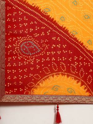 Women's yellow bandhani print chiffon bandhej style saree with matching blouse 4