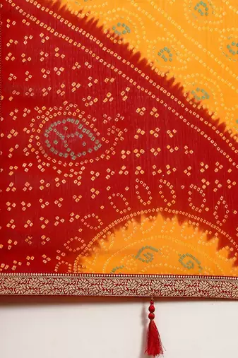 Women's yellow bandhani print chiffon bandhej style saree with matching blouse