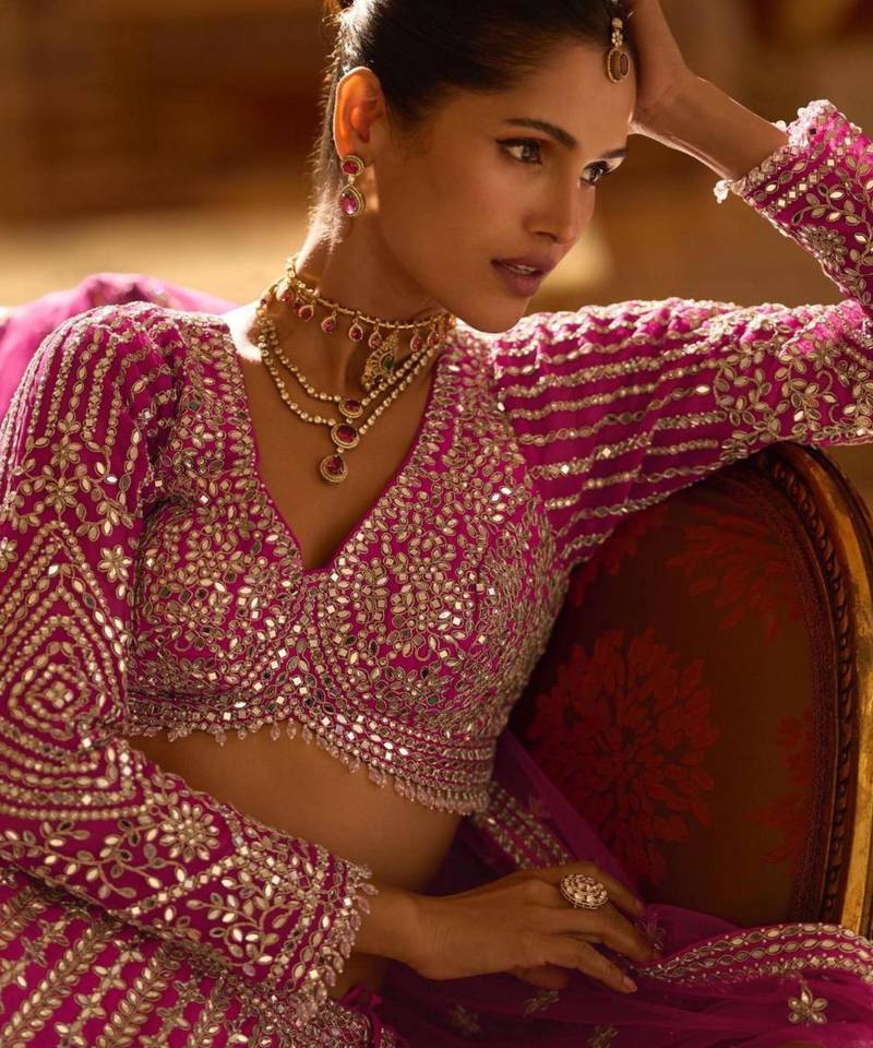rani-pink art_silk embroidered lehengas