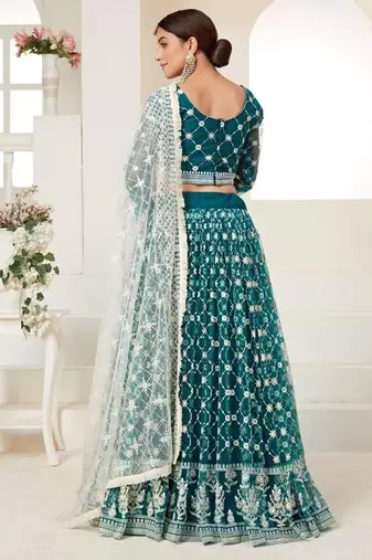 teal green embroidered net lehenga set