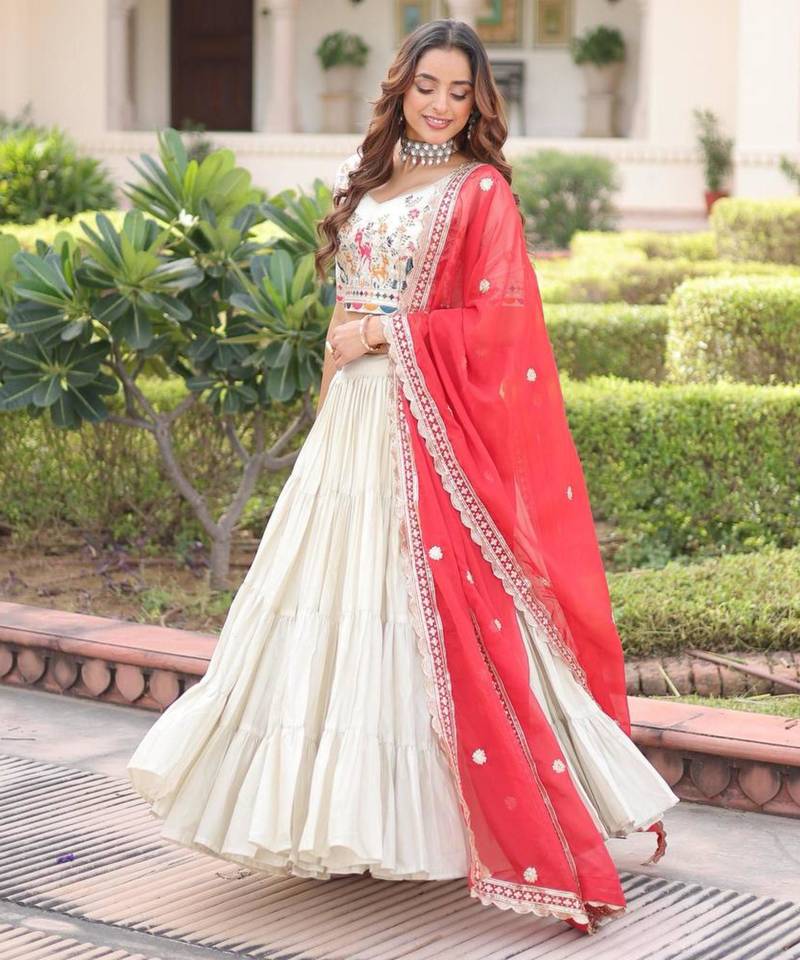 off-white silk embroidered lehengas