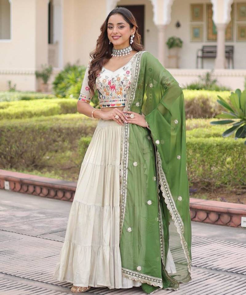 off-white silk embroidered lehengas