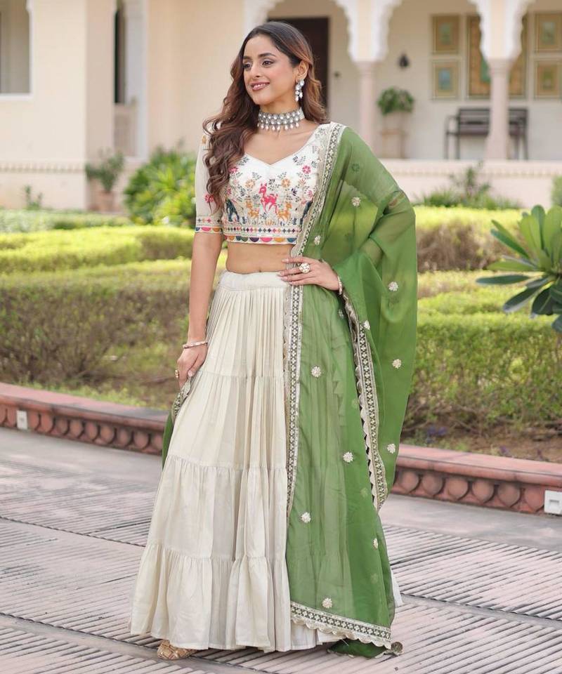off-white silk embroidered lehengas