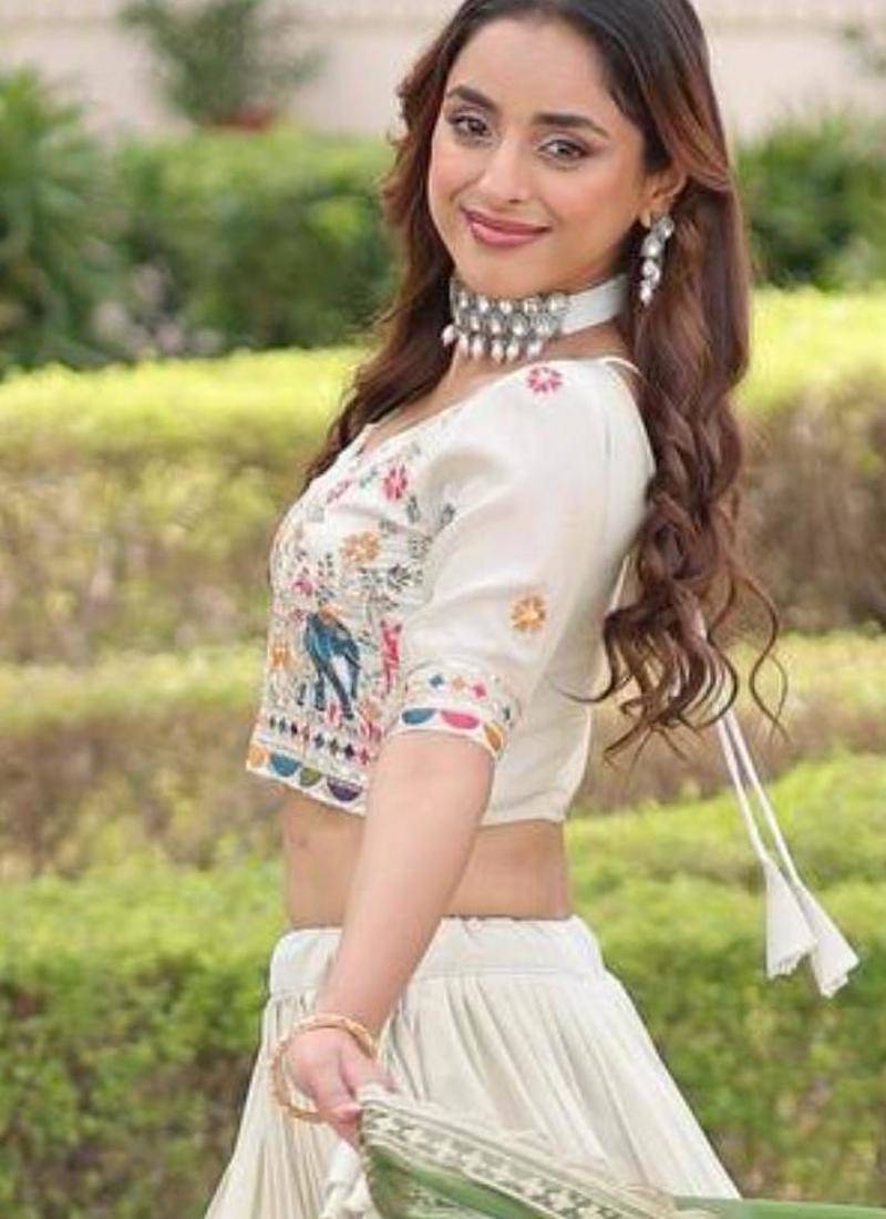 off-white silk embroidered lehengas