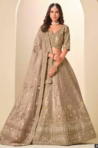 dark-beige art_silk embroidered lehengas