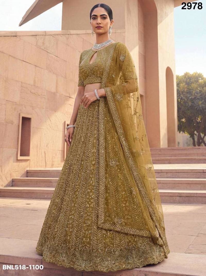 mustard net embroidered Lehenga set