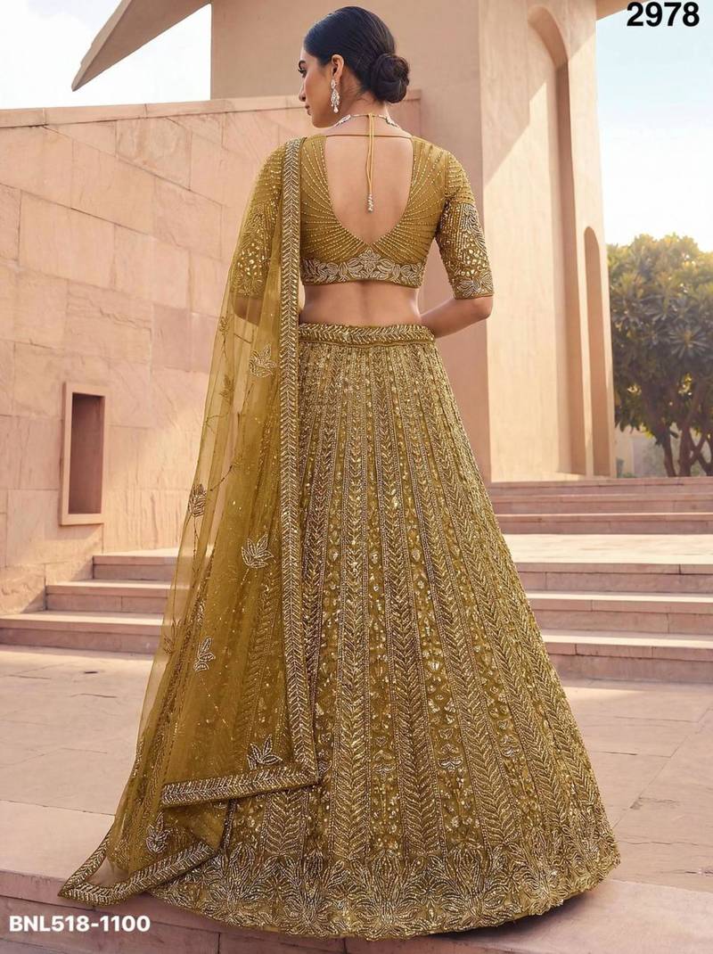 mustard net embroidered Lehenga set