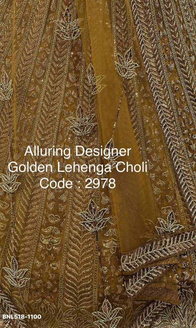 mustard net embroidered Lehenga set