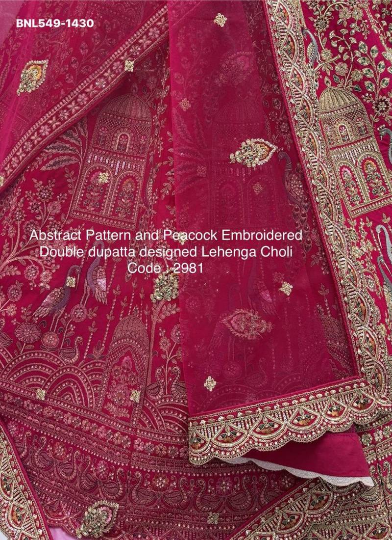 rani pink silk embroidered Lehenga set