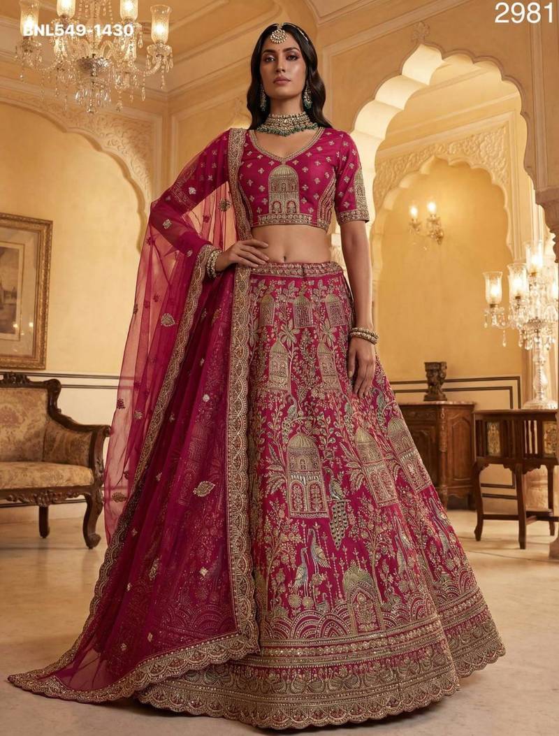 rani pink silk embroidered Lehenga set