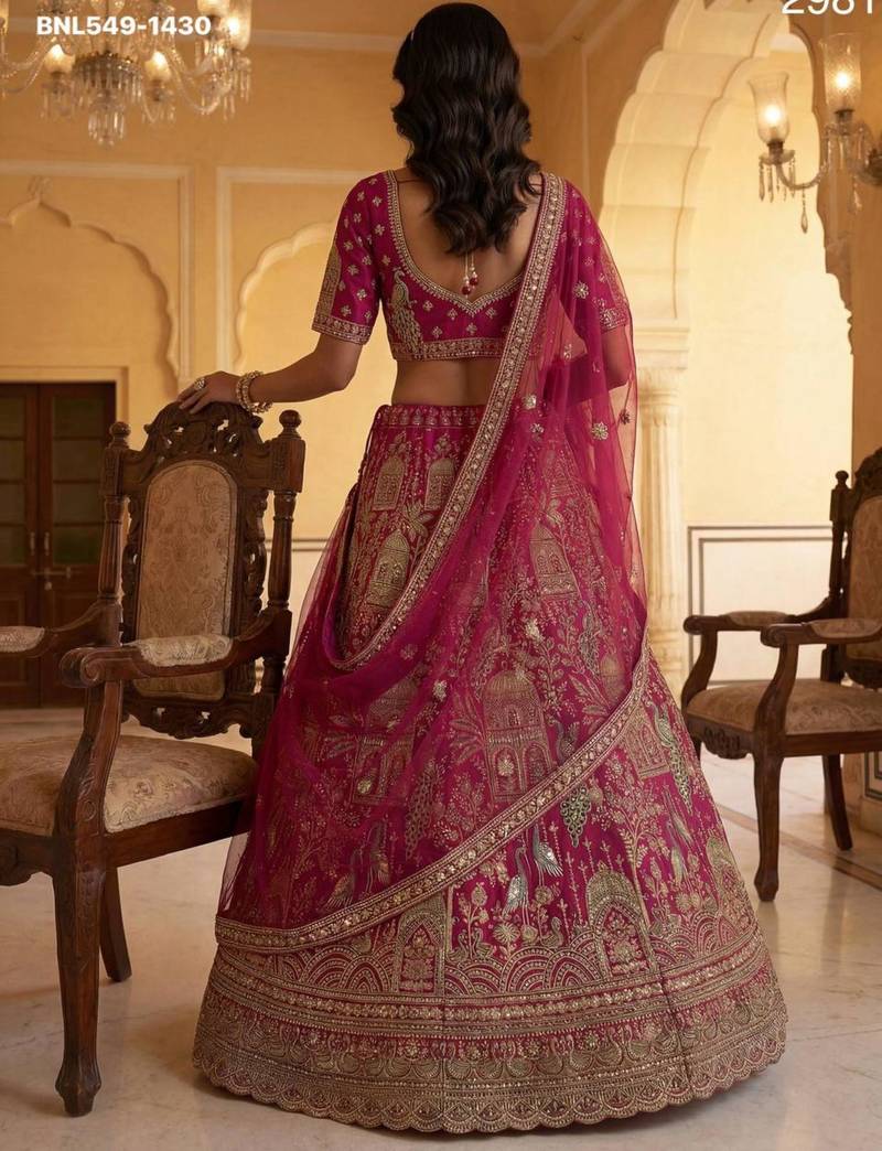rani pink silk embroidered Lehenga set