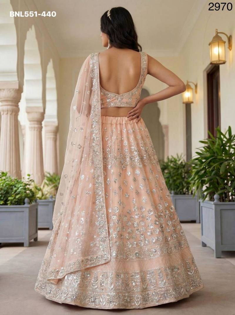 light peach net embroidered Lehenga set