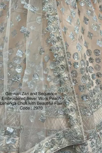 light peach embroidered net lehenga set