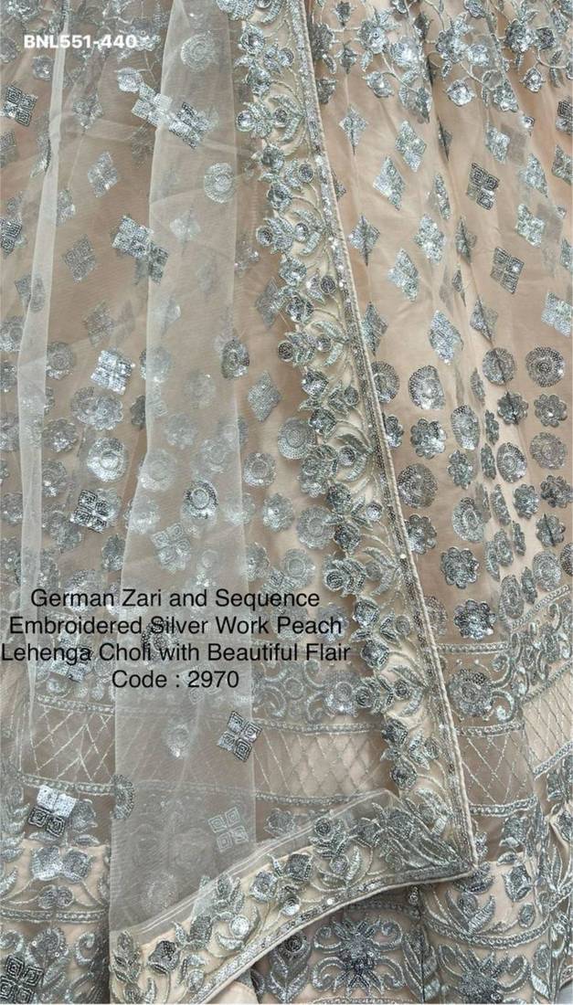 light peach net embroidered Lehenga set