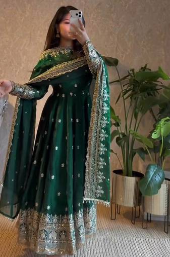 Dark green heavy flared wedding wear anarkali salwar kameez
