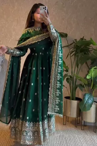 Dark green heavy flared wedding wear anarkali salwar kameez