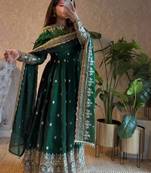Dark green heavy flared wedding wear anarkali salwar kameez