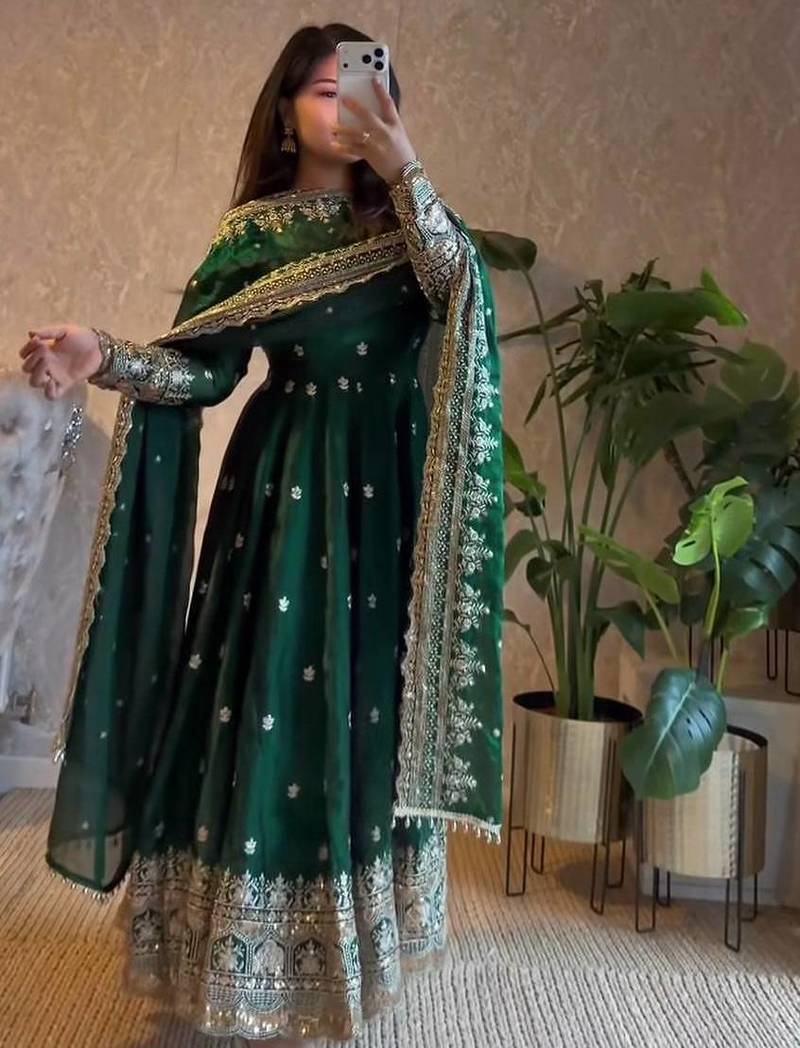Dark green heavy flared wedding wear anarkali salwar kameez